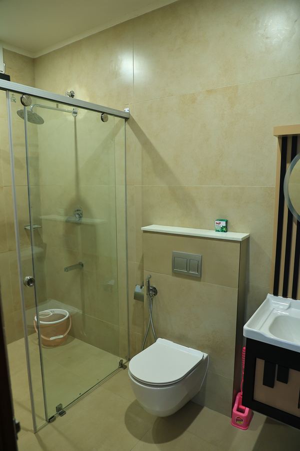 A bathroom with a glass shower