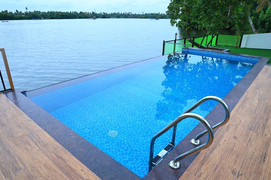 The infinity pool with the lake beyond