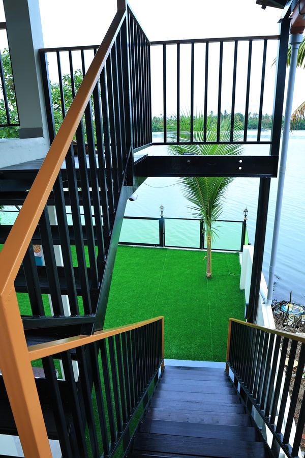 The outdoor staircase down to the lakeside lawn